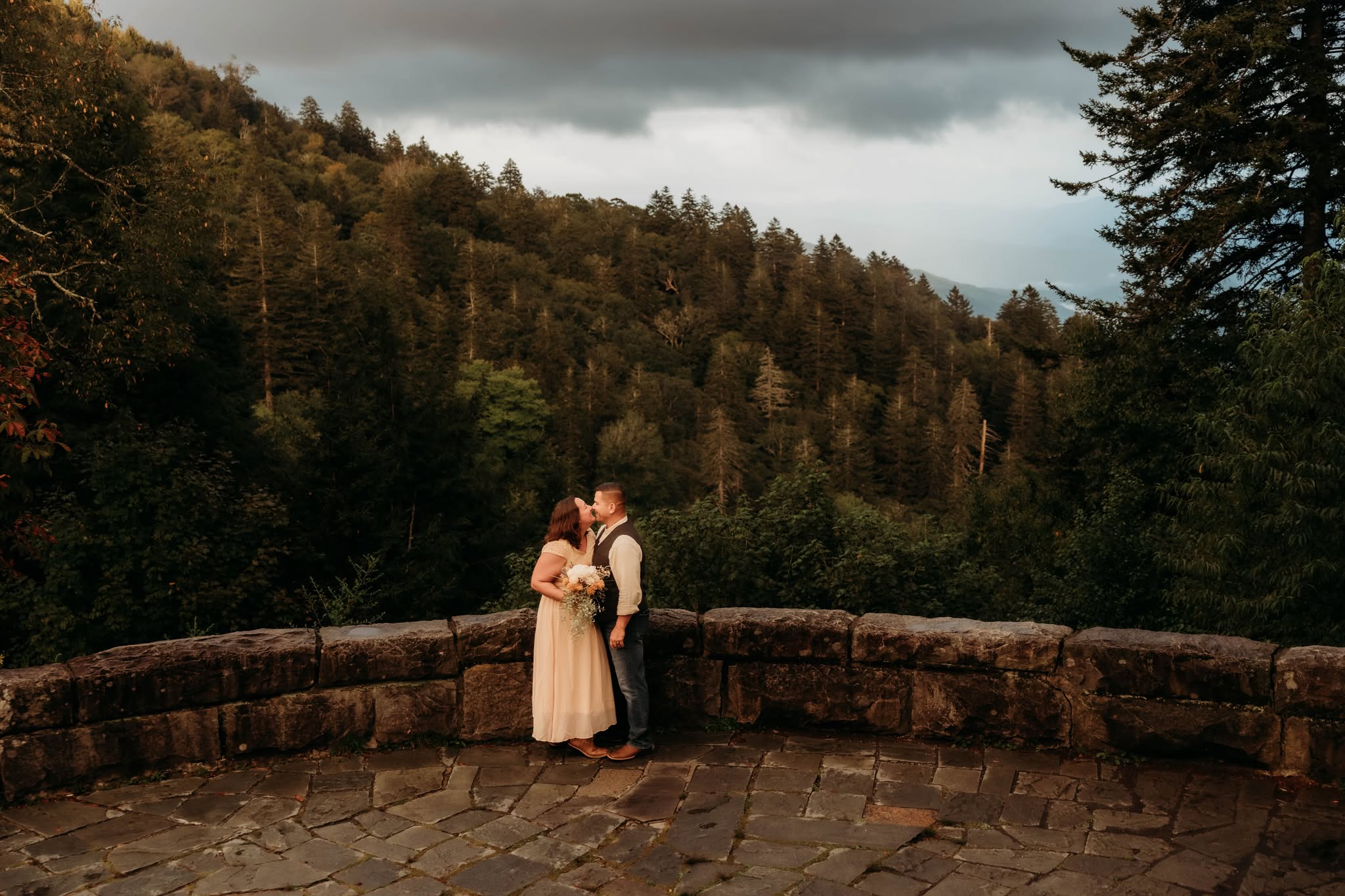 An eloping couple surrounded by mountain views at Newfound Gap